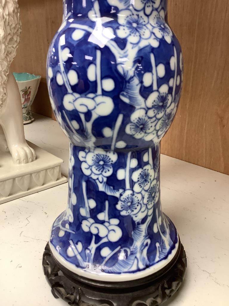 A Chinese blue and white porcelain vase, circa 1900, with Kangxi mark, total height 28.5cm